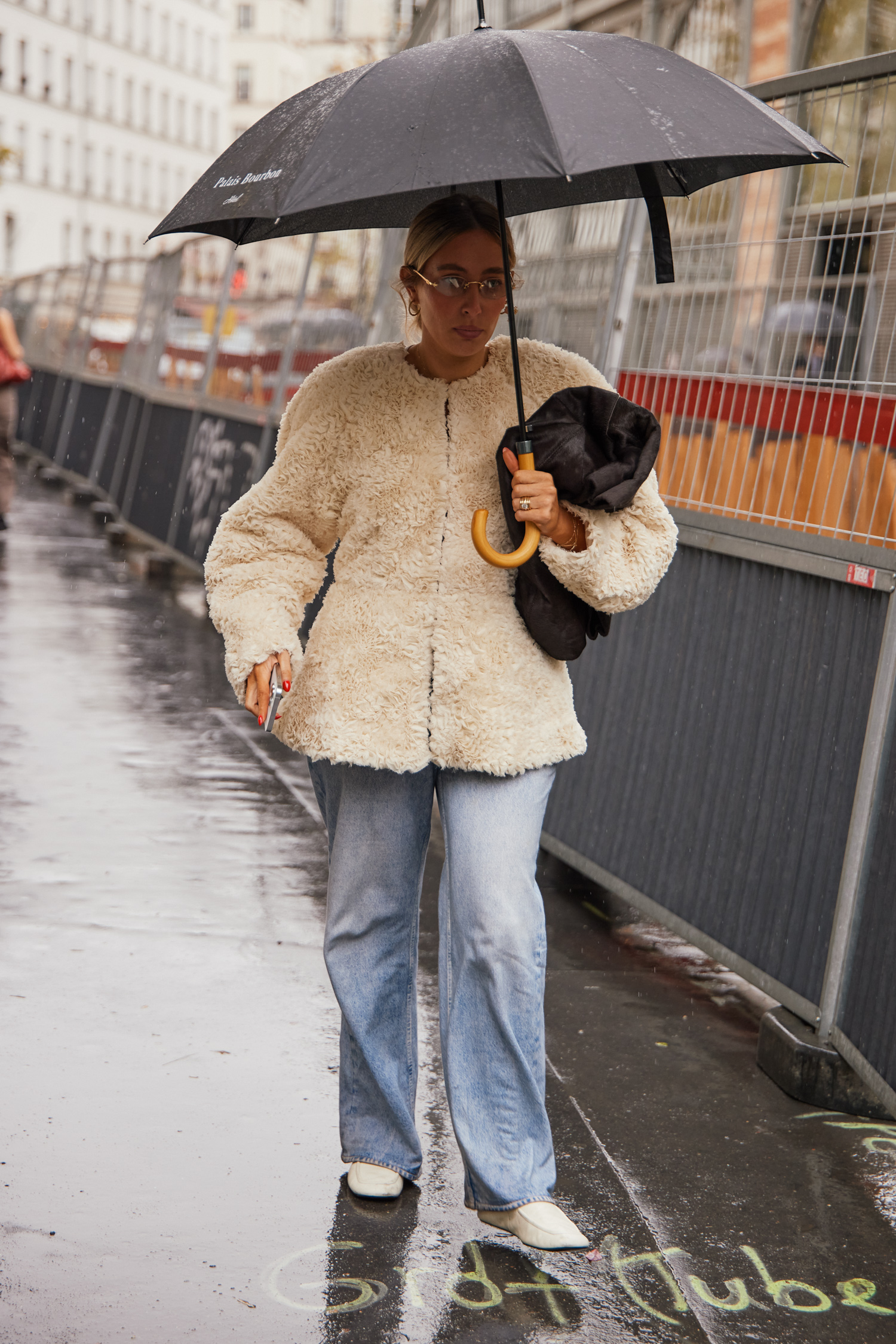 A Paris Fashion Week attendee shows off their outfit.
