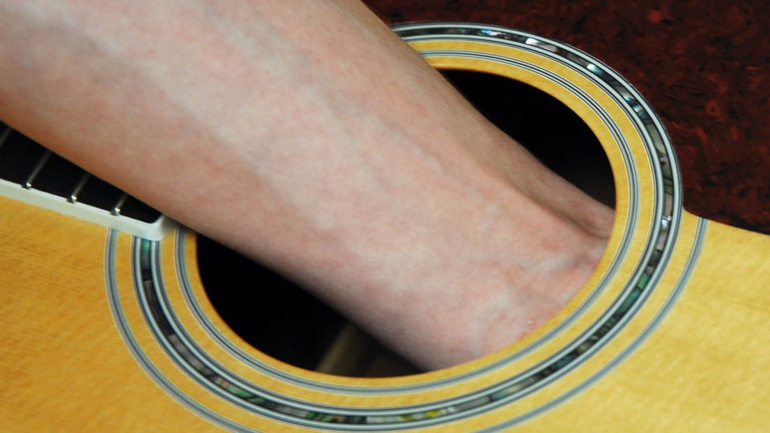 Guitar setup how to remove bridge pins on an acoustic guitar MusicRadar