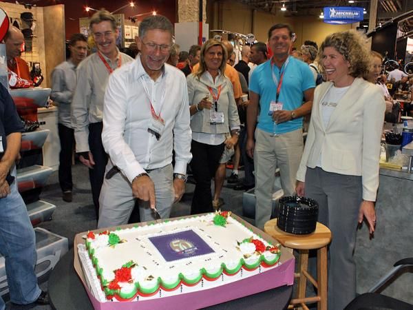 Sidi celebrates its 50th anniversary at Interbike with a giant cake and a bit of champagne.