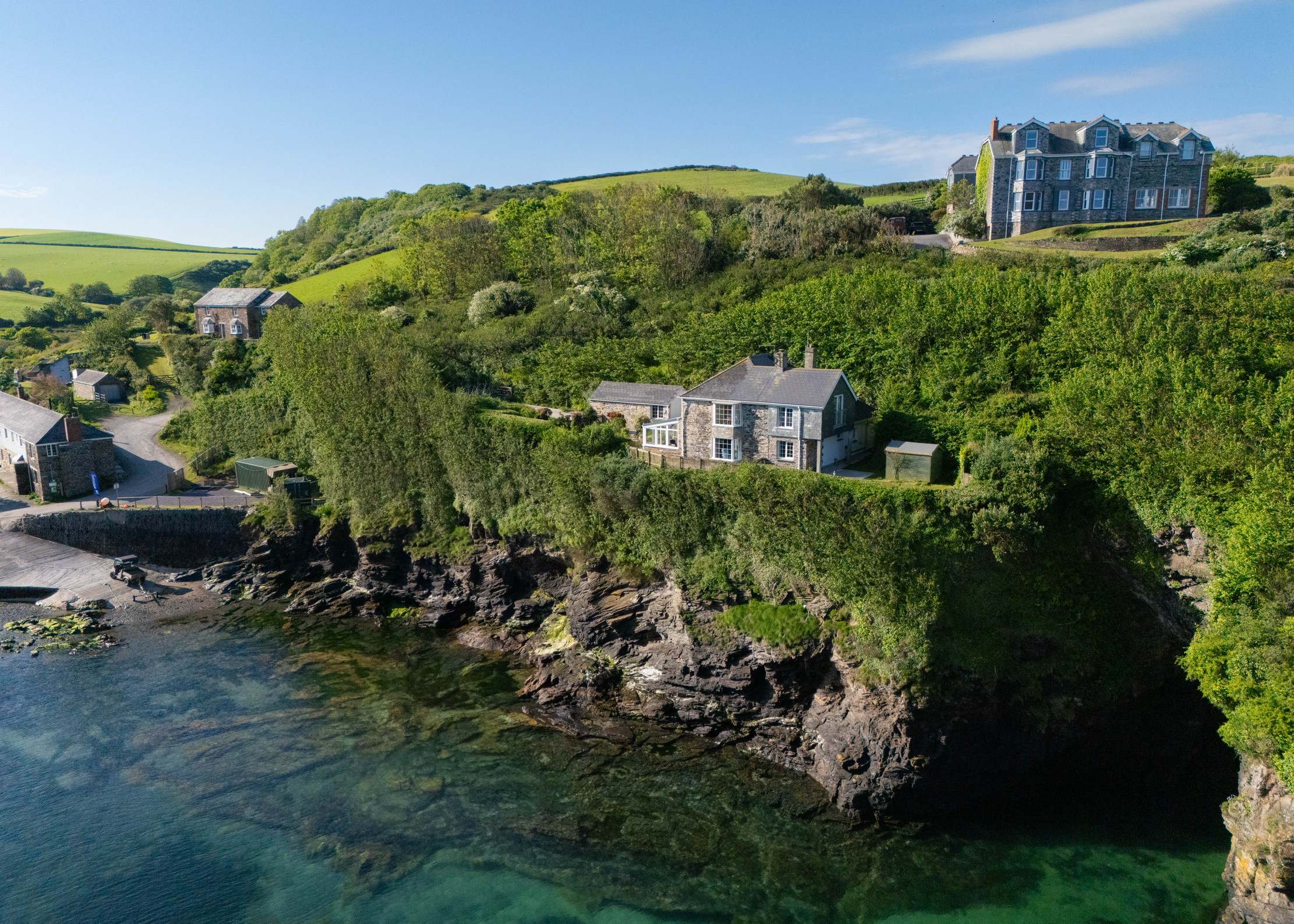 Images of the glorious cove-side home of Tregwyn in Cornwall