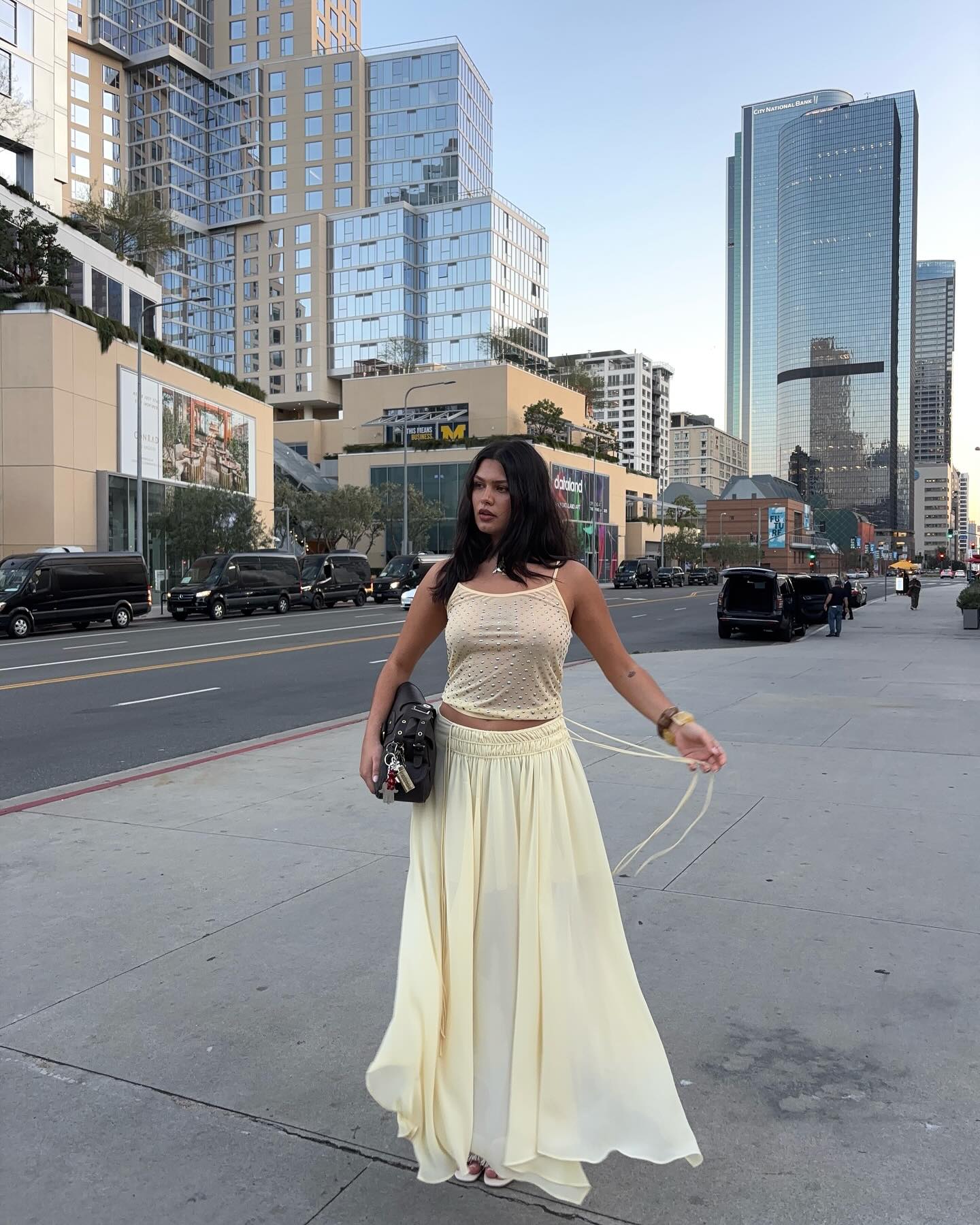 Simple Summer Outfits: @isabellecoheen wears a yellow skirt and matching top