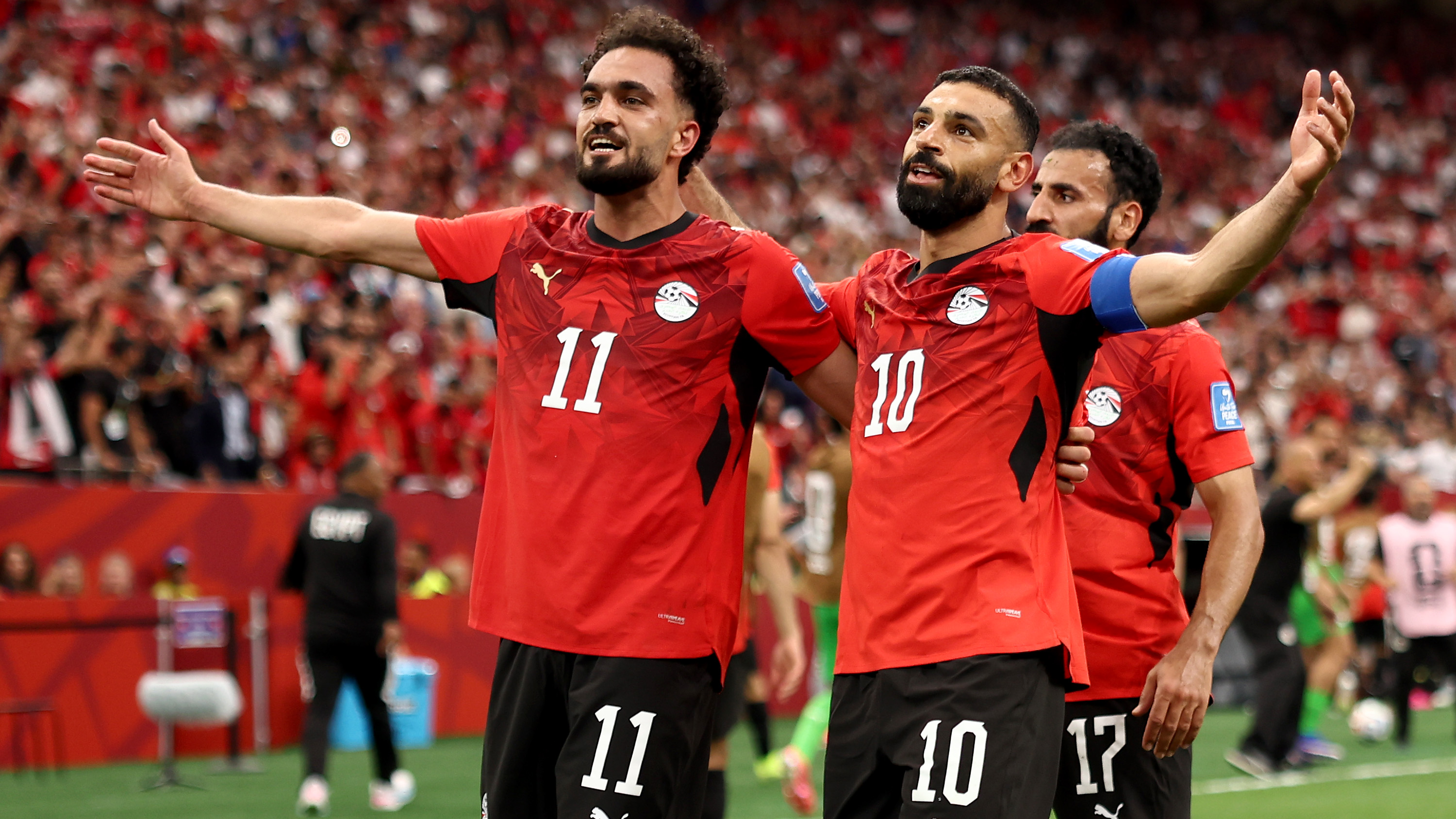 Mohamed Salah #10 of Egypt celebrates with Mostafa Zico #11 after scoring the team's second goal during the FIFA World Cup 2026 Group G match between New Zealand and Egypt