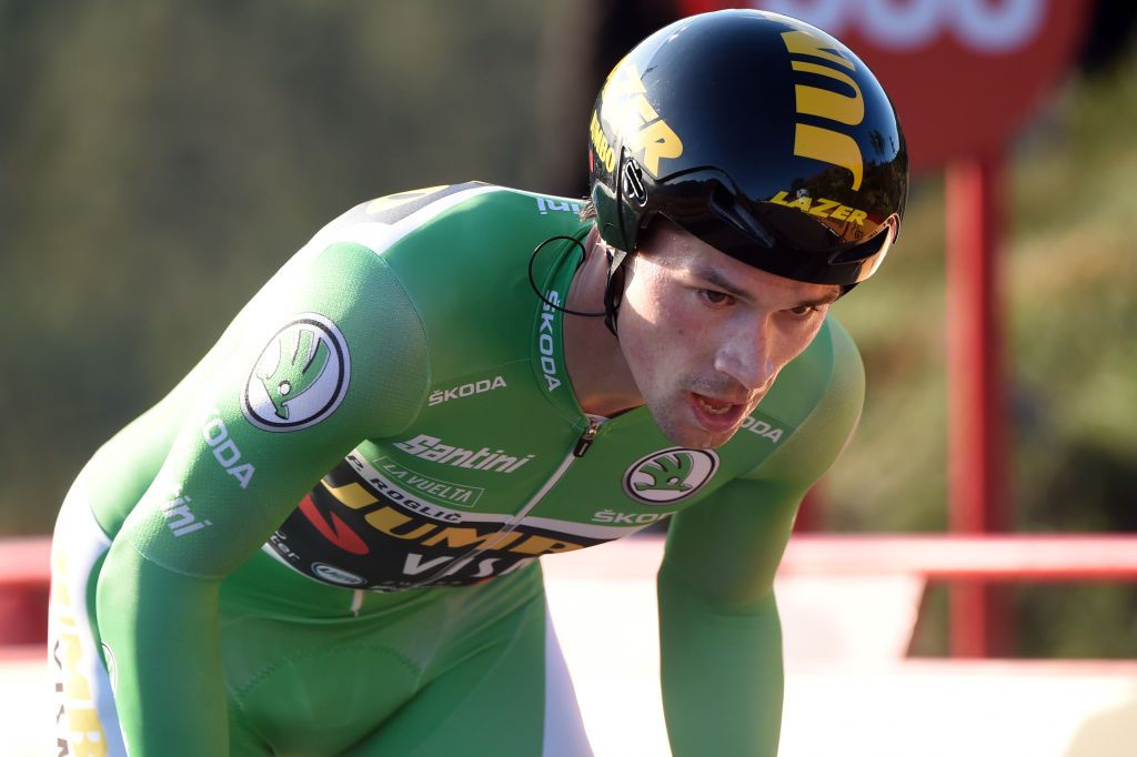 Team Jumbo rider Slovenias Primoz Roglic competes during the 13th stage of the 2020 La Vuelta cycling tour of Spain a 337km individual timetrial from Muros to Mirador de Ezaro Dumbria on November 3 2020 Slovenian Primoz Roglic claimed victory in the Vuelta a Espana time trial on today to regain the lead in the overall classification Roglic took back the red jersey from Ecuadors Richard Carapaz while Britains Hugh Carthy sits third ahead of the races climax on November 1 2020 Photo by MIGUEL RIOPA AFP Photo by MIGUEL RIOPAAFP via Getty Images