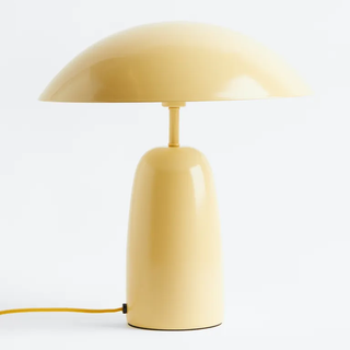 yellow metal table lamp