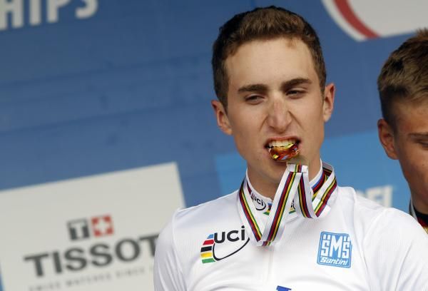 Taylor Phinney (USA) takes a bite out of his U23 gold medal.