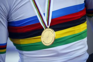 The rainbow bands and gold medal for the winner