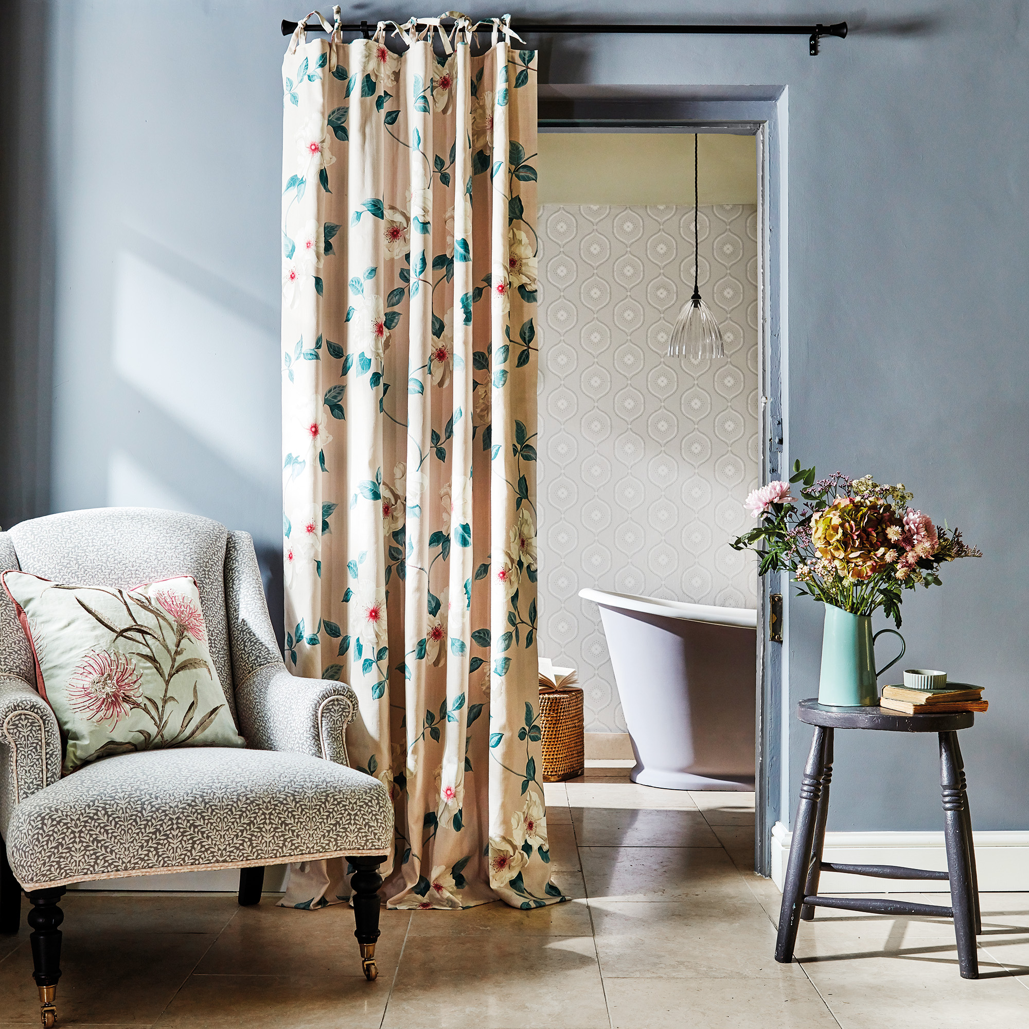 curtain door in bedroom leading through to ensuite bathroom