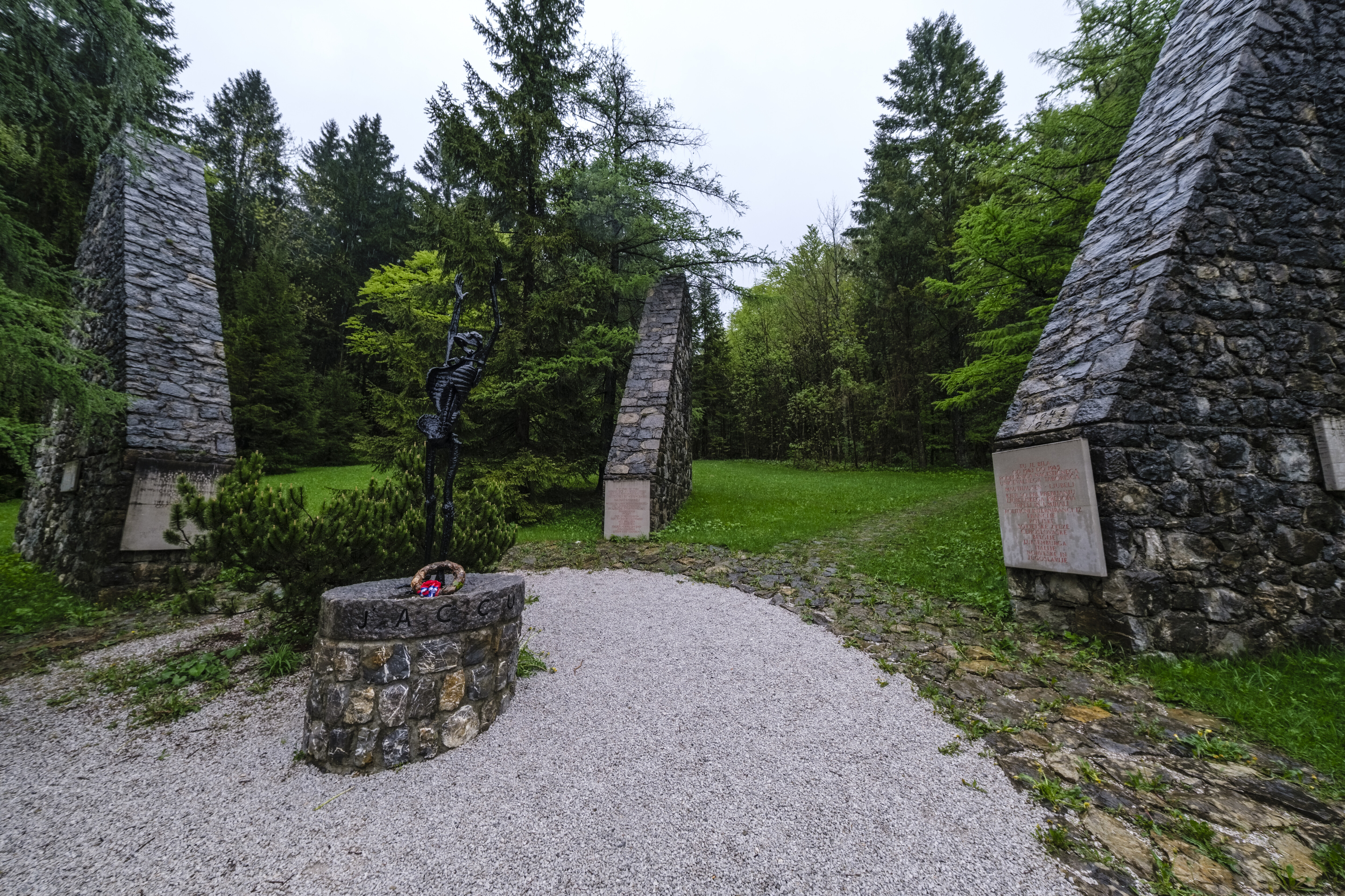 Spomenik NOB, war memorial at the former concentration camp KZ Loibl in a green mountain valley with misty forests, Upper Carniola, Slovenia