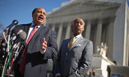 Martin Luther King III and Rev. Al Sharpton talk to reporters about the Voting Rights Act on Feb. 27.