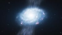 a white spiral-shaped cloud of dots of light on a black background