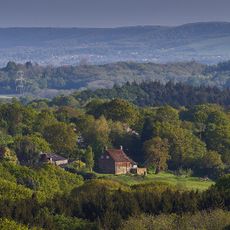 Downgate Farmhouse nestled among the trees of the High Weald AONB.