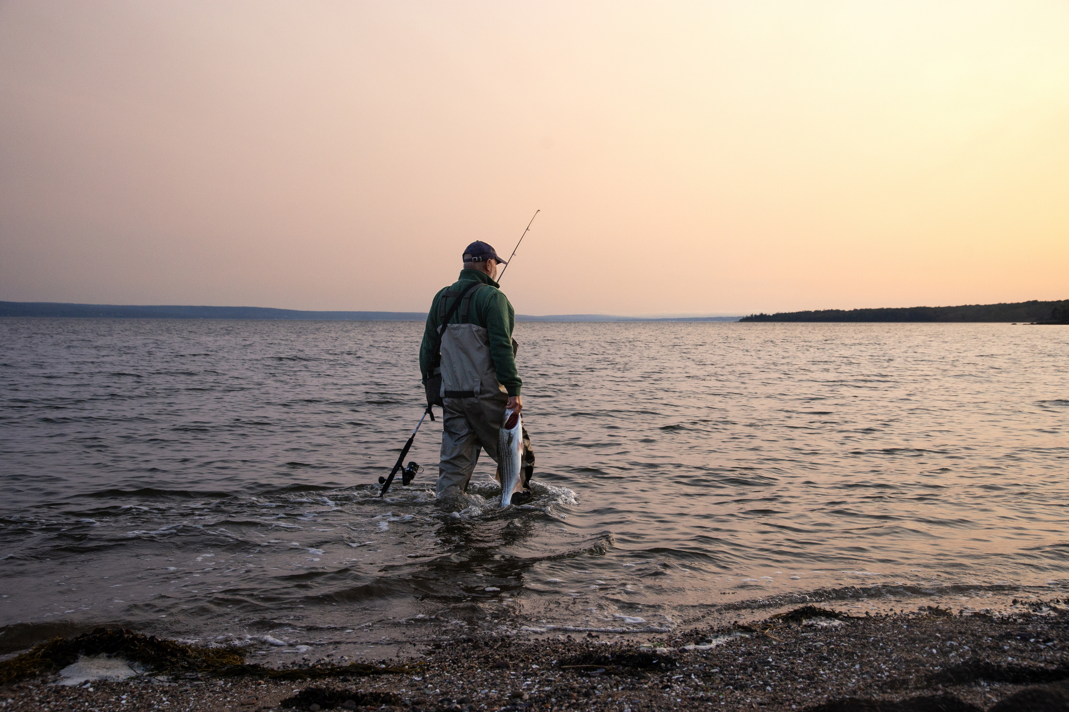 man fly fishing