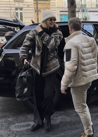 Gigi Hadid is spotted arriving at her hotel in Paris as she prepares for Paris Fashion Week.