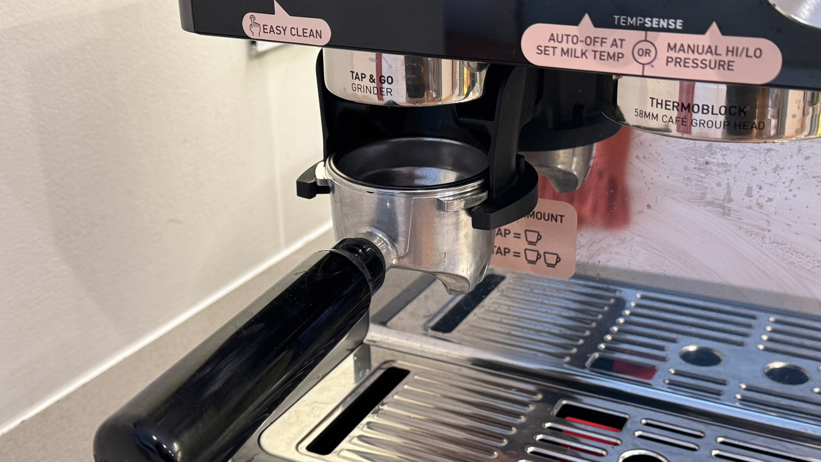 The portafilter in the cradle of the Sunbeam Origins Sense