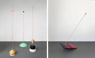 Four abstract floor sculptures with tall antenna and glossy paint finish