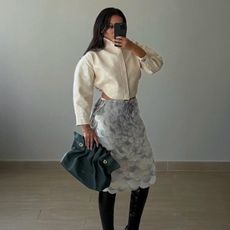 woman wearing over the knee boot outfit 2026