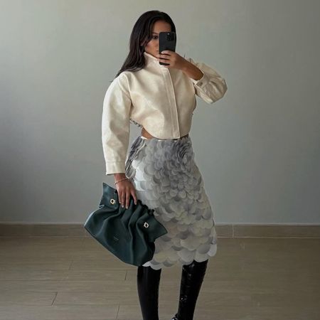 woman wearing over the knee boot outfit 2026