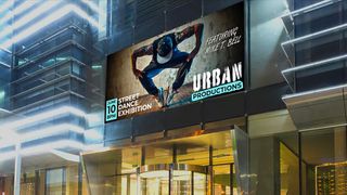 A Daktronics digital billboard showcasing a dancer for an Urban Production showcase. 