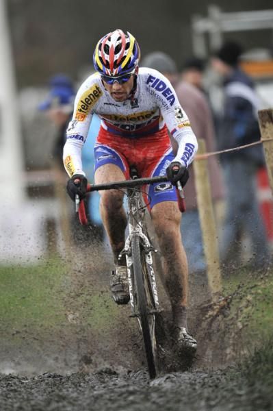 Zdenek &Scaron;tybar (Telenet Fidea Cycling Team) makes his way up the muddy climb