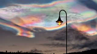 Iridescent, rainbow-colored clouds in the sky