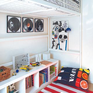 bedroom with white wall and bookshelves