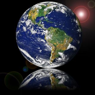 Globe NASA - Visible Earth - reflected on glass