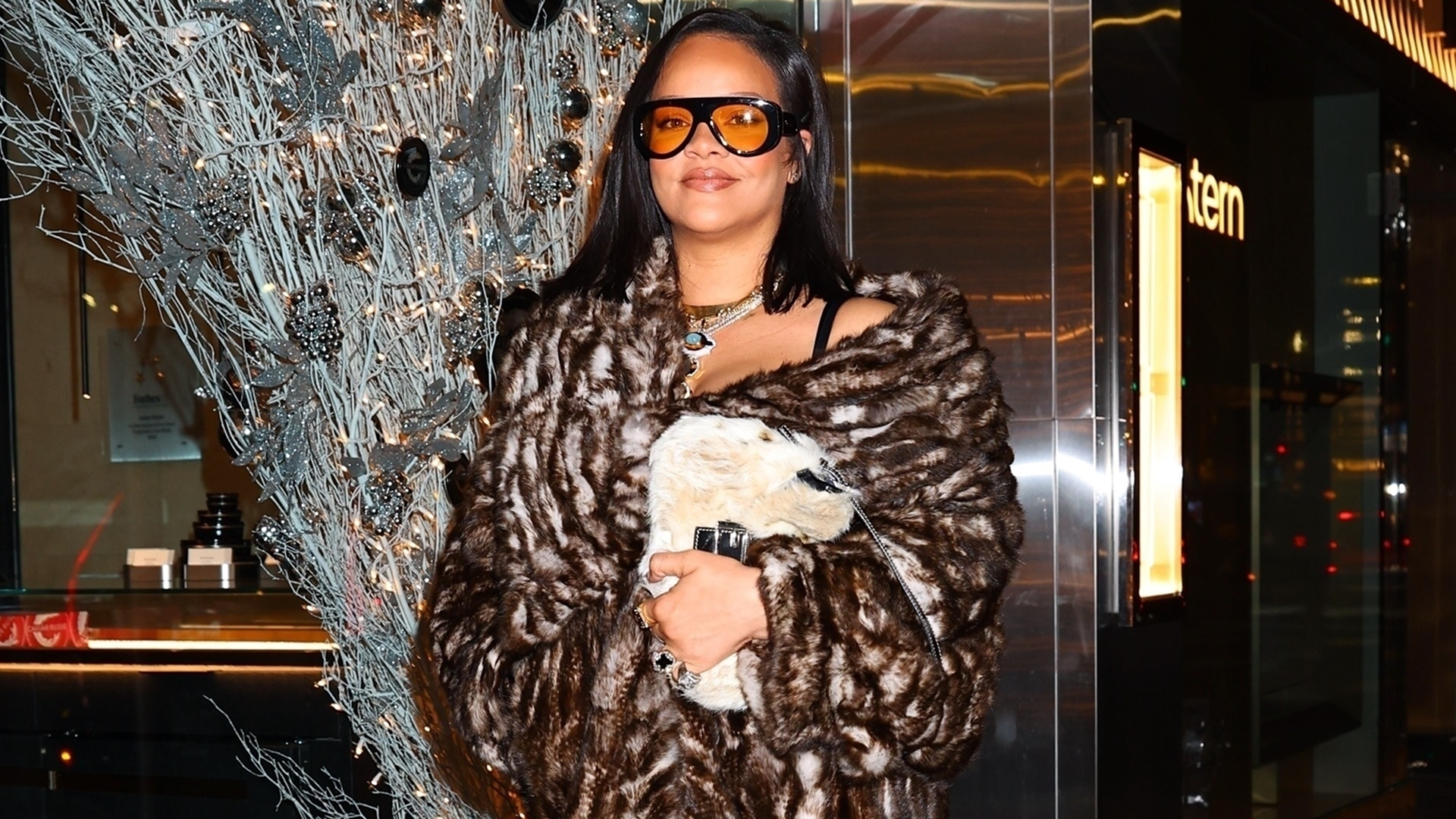 Rihanna was spotted in New York City wearing brown trousers, a fur coat, and a matching Fendi bag