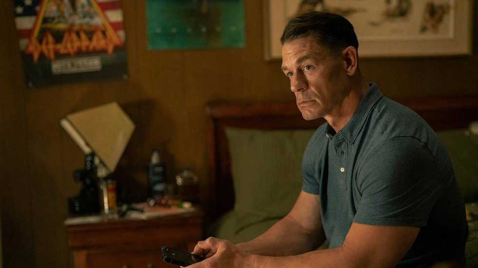 John Cena as Chris Smith / Peacemaker, looking sad in Peacemaker season 2.