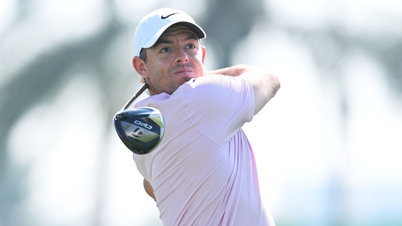 Rory McIlroy takes a shot in a practice round before the 2024 Dubai Invitational