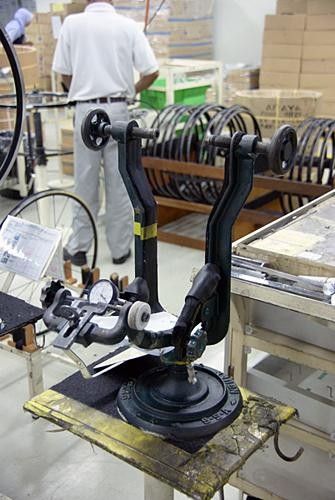 The truing stands look low-tech but are undeniably burly.