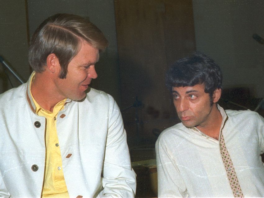Sharp-dressed men: Glen Campbell and Hal Blaine hang in the studio