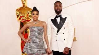 HOLLYWOOD, CALIFORNIA - MARCH 10: (L-R) Gabrielle Union-Wade and Dwyane Wade attend the 96th Annual Academy Awards on March 10, 2024 in Hollywood, California.