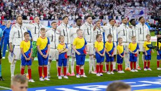 England's players line-up ahead of their Euro 2024 opener against Serbia.