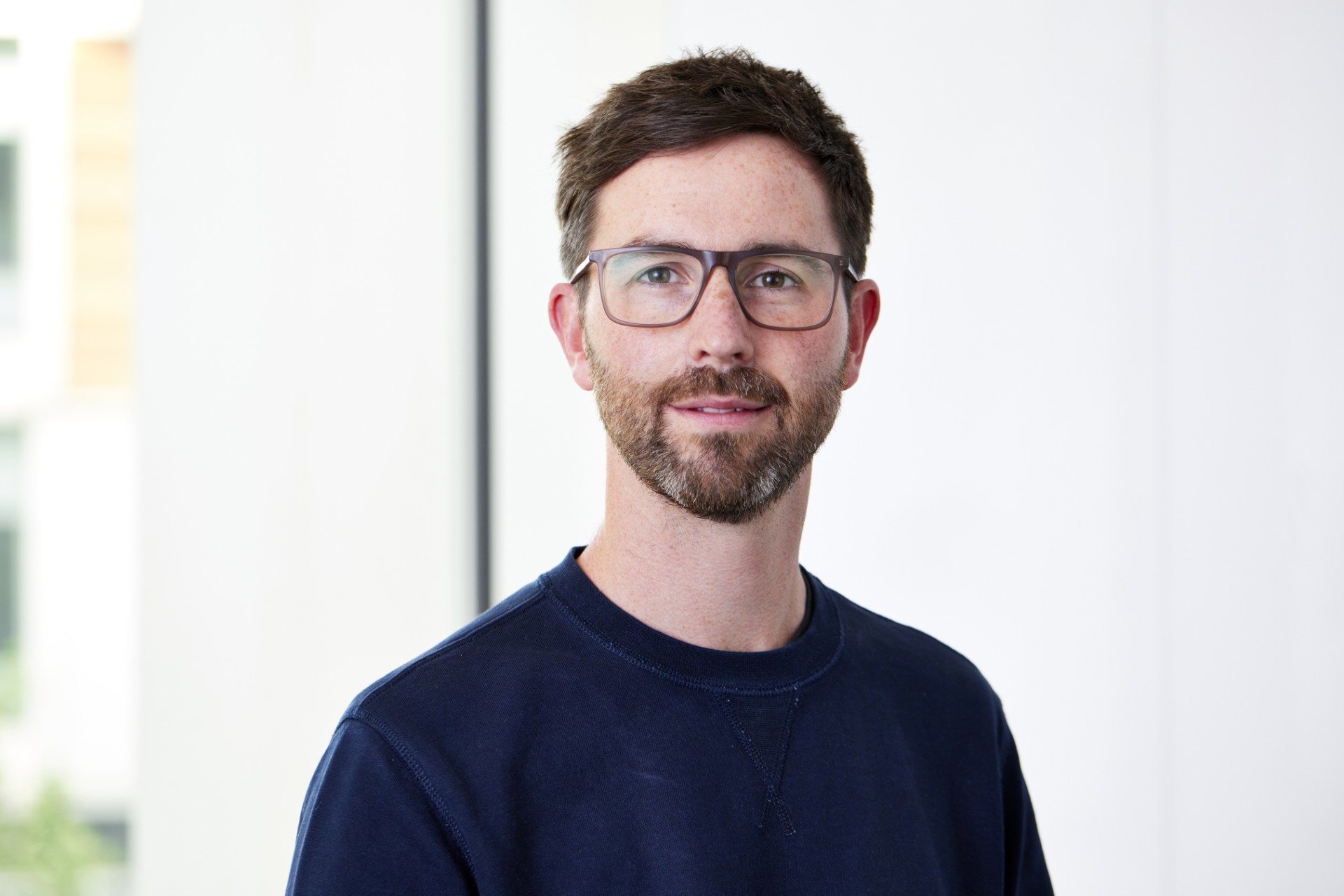 man with beard and glasses
