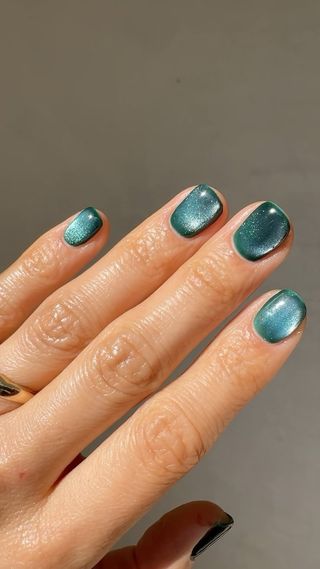 Turquoise cat eye nails