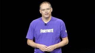 Tim Sweeney on stage wearing a Fortnite shirt.