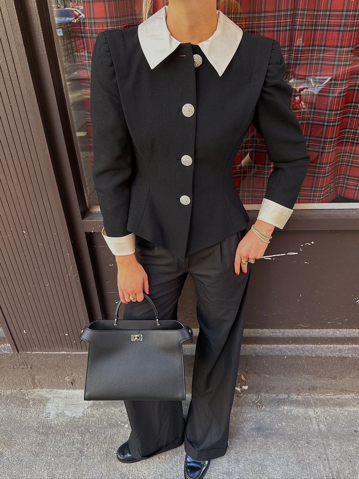 Woman wearing fall outfit with loafers.