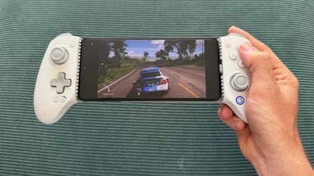 The GameSir G8+ MFi mobile controller on a green surface