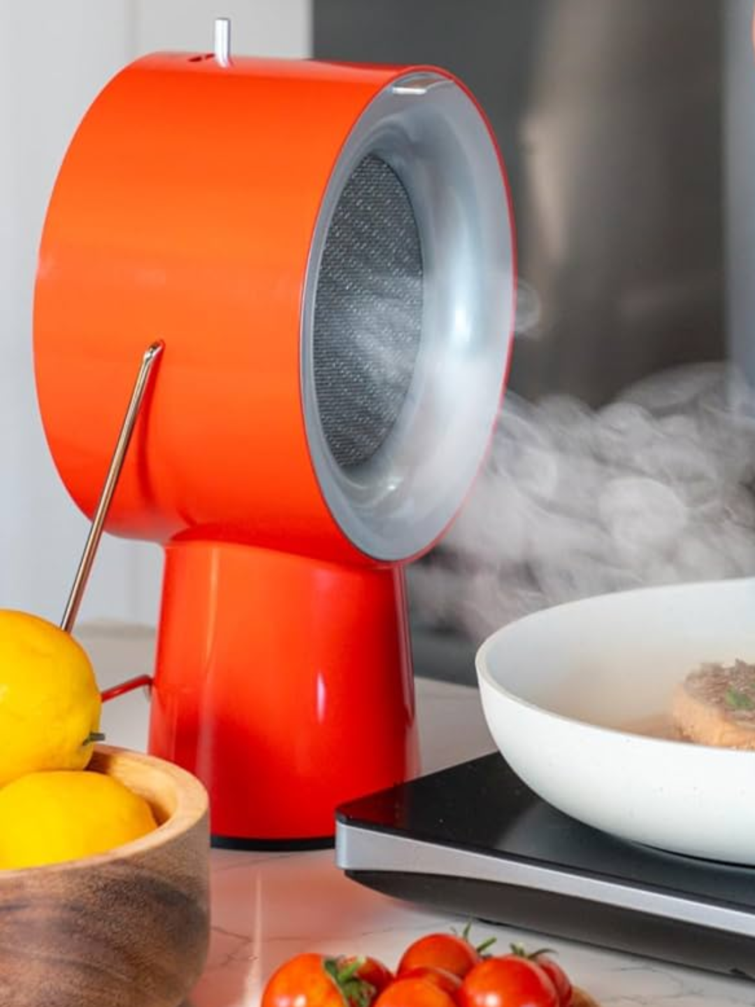 An orange kitchen extractor hood
