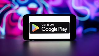 In this photo illustration, the Google play store logo is seen displayed on a mobile phone screen.