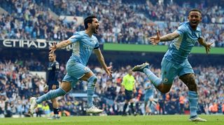 Ilkay Gundogan celebrates scoring for Manchester City against Aston Villa on a dramatic final day in the Premier League.