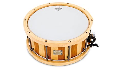 With its maple ply counter hoops and recessed tuning bolts, this cherry/birch snare is quite striking
