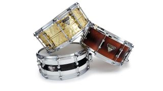The beading on the Hammered Brass snare's thin shell (top) adds rigidity and strength