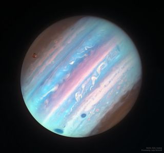 Trans astronomers are fighting against name change policies at scientific journals that have previously prohibited authors from retroactively updating their names on publications. This image showcases Jupiter in stunning color in an ultraviolet image from Hubble. 
