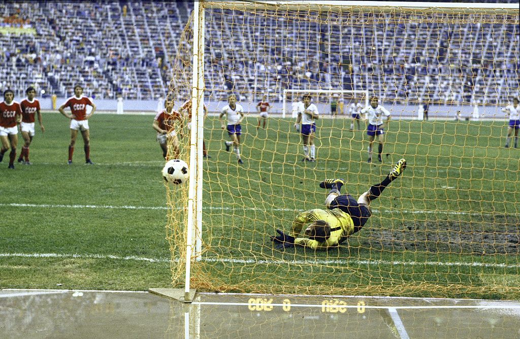 Soccer: 1976 Summer Olympics: East Germany (white) in action vs USSR (red) during Men's Semifinal at Olympic Stadium. East Germany won 2-1. Montreal, Canada 7/27/1976 CREDIT: James Drake (Photo by James Drake /Sports Illustrated via Getty Images) (Set Number: X20680 )