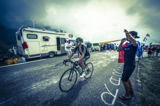 Cyril Gautier team Europcar climbs the final kilometres of the Hautacam cheered on by fans Ow! not in the ear.. That really hurt!