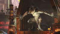 A deathclaw from Fallout 4 clings to the edges of its cage, ready to do battle.