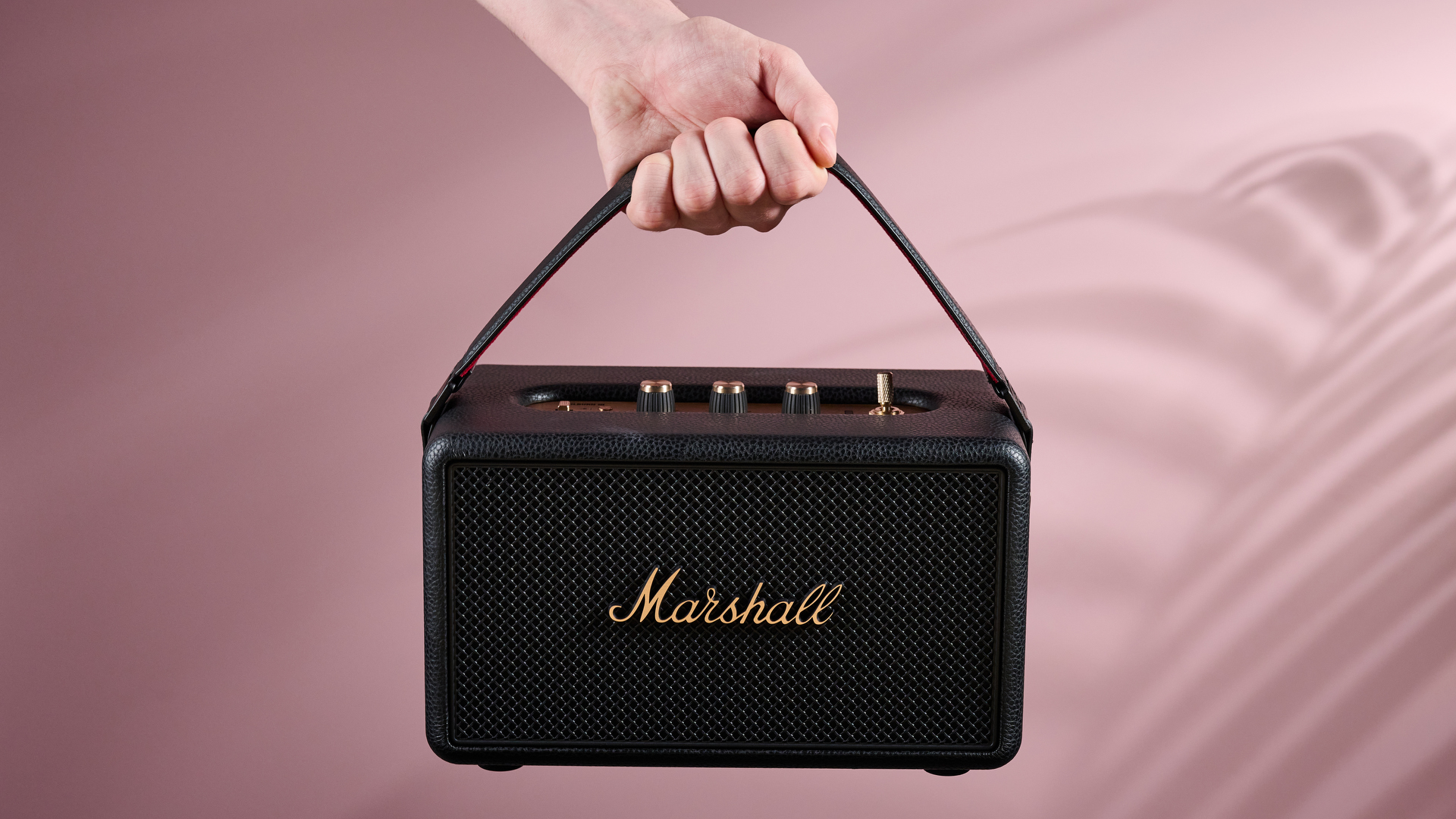 Person holding the Marshall Kilburn III