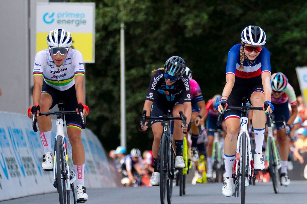 CHUR SWITZERLAND JUNE 20 LR Elisa Balsamo of Italy and Team Trek Segafredo crosses the finishing line to win ahead of vita Muzic of France and Team FDJ NouvelleAquitaine Futuroscope and Liane Lippert of Germany and Team DSM during the 2nd Tour de Suisse Women 2022 Stage 3 a 1242km stage from Vaduz to Chur on June 20 2022 in Chur Switzerland Photo by Heinz ZwickyGetty Images