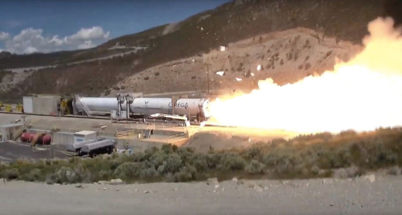 Pieces of the nozzle on Northrop Grumman's OmegA rocket first stage fly during a full-scale ground test in Utah on May 30, 2019.